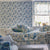 Blue and white patterned wallpaper and matching soft furnishings