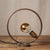Distressed circular brass table lamp